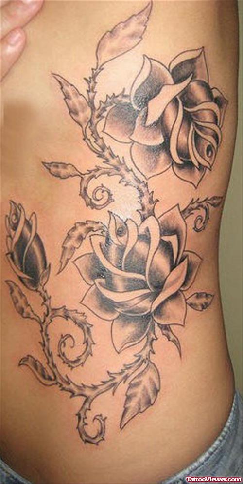 Grey Flowers Tattoos On Rib