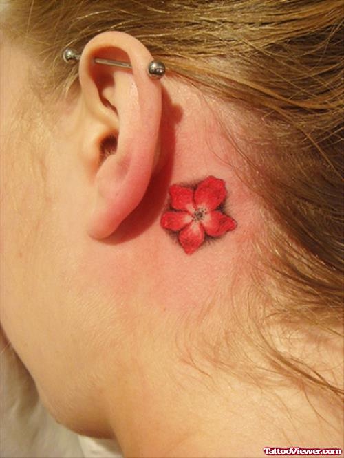 Red Flower Tattoo Behind Ear