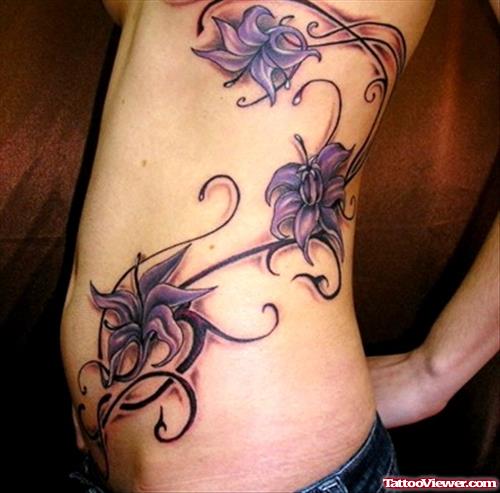 Purple Flower Tattoos On Rib