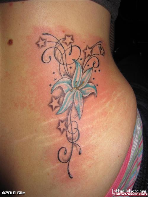 Stars and Blue Flower Tattoo On Side