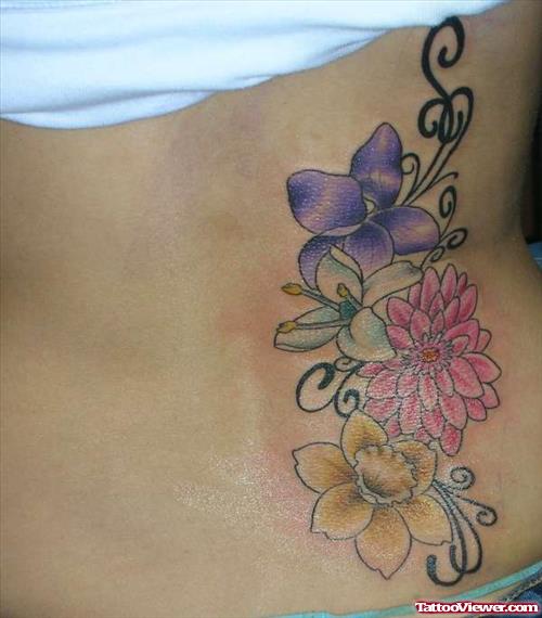 Colored Flowers Tattoos On Back