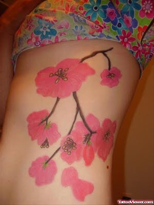 Pink Flower Tattoos On Girl Side Rib