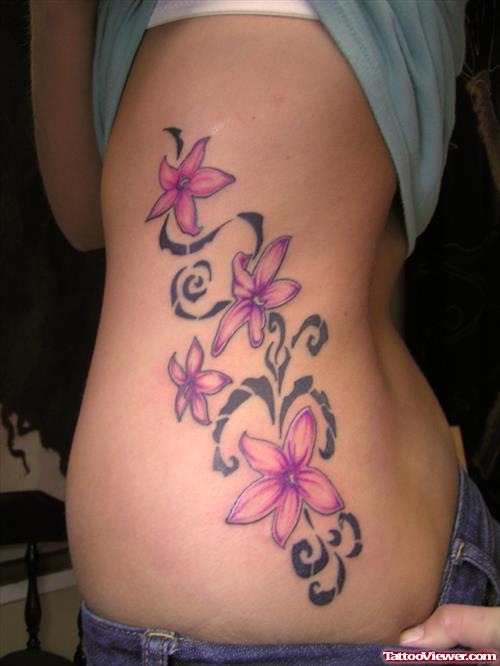 Hawaiian Flower Tattoos On Left Side Rib