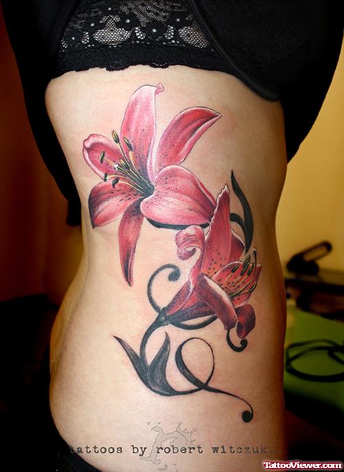 Awesome Tribal And Flower Tattoo On Rib