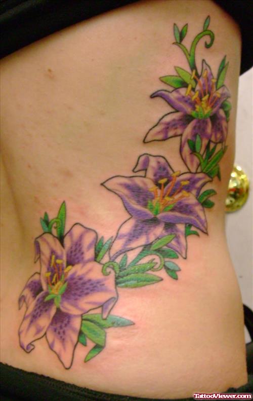 Purple Flowers Tattoos On Lowerback