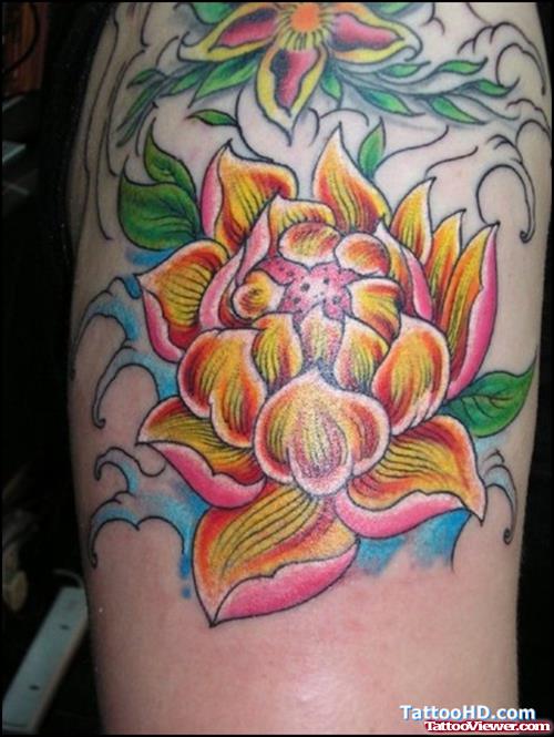 Flower Tattoo On Right Shoulder
