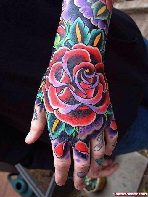 Awesome Red Ink Flower Tattoo On Hand