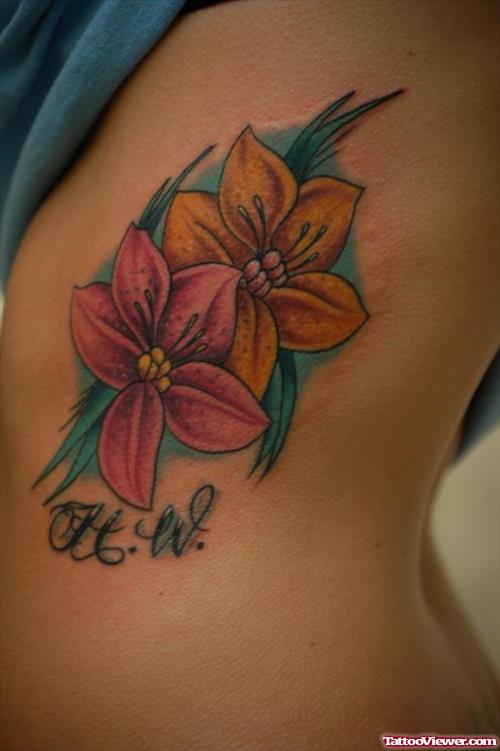 Attractive Girl RIb Side Flower Tattoos
