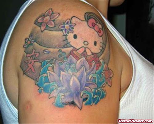 Kitty Head and Flower Tattoos On Right Shoulder