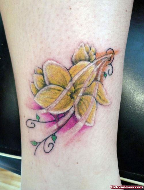 Yellow Flower Tattoo On Leg