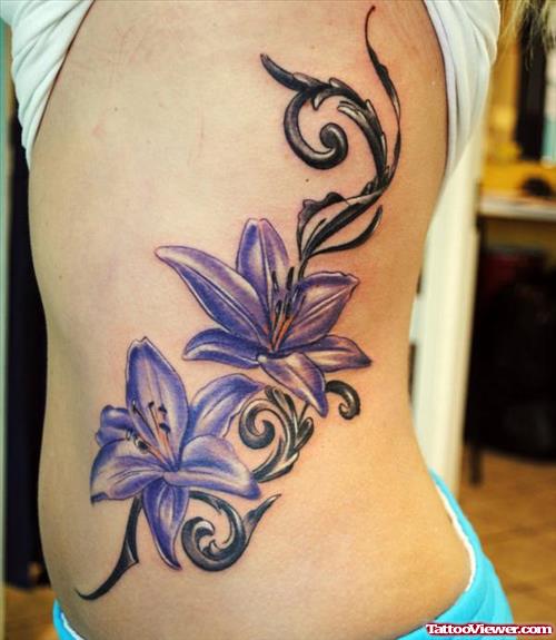 Purple Flower Tattoo On Rib Side