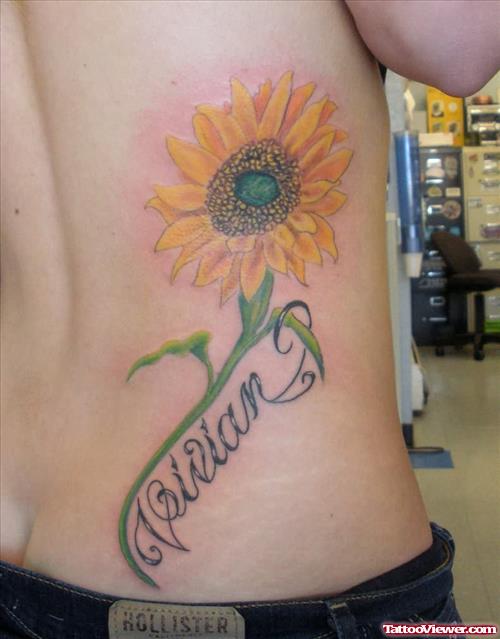 Yellow Flower Tattoo On Rib Side