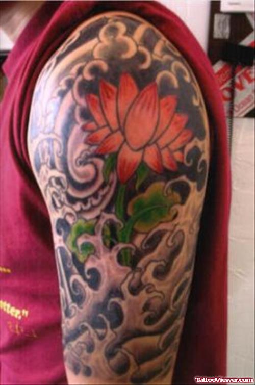 Grey Clouds And Lotus Flower Tattoo On Left Half Sleeve