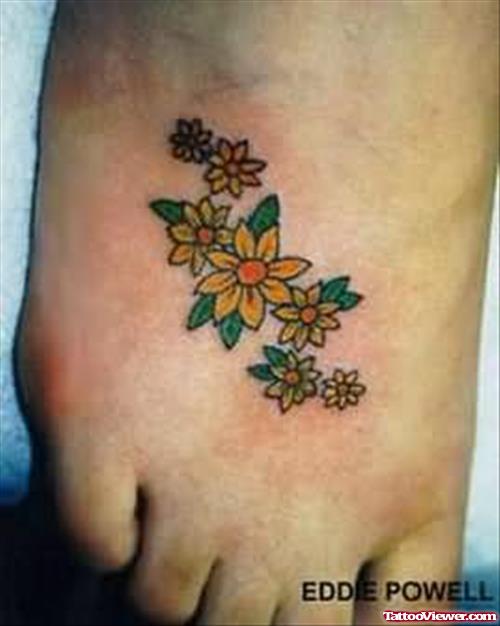 Yellow Flower Tattoo On Foot