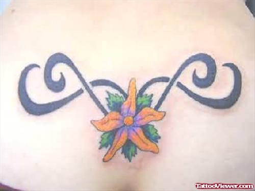 Little Orange Flower Tattoo