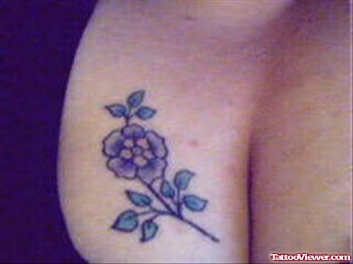 Small Flower Tattoo On Breast