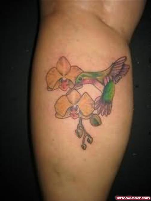 Orchid Bird Tattoo On Leg