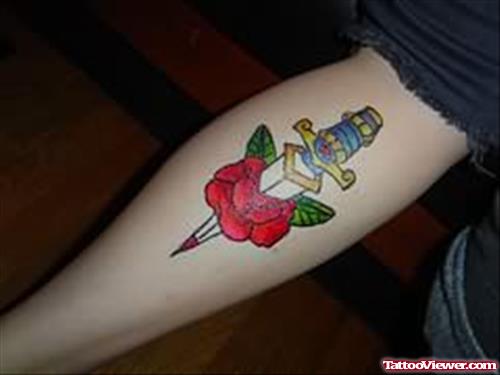 Knife Through Flower Tattoo
