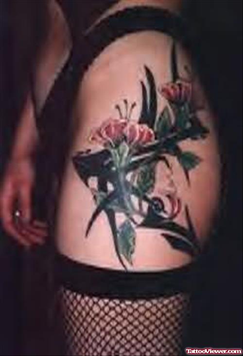 Girl Showing Flower Tattoo On Leg
