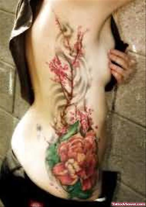 Big Flowers Tattoo On Rib