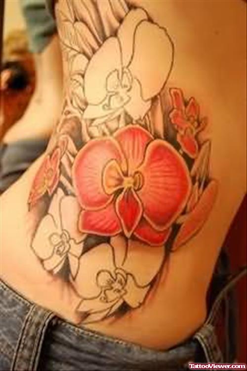 Orchid Flower Tattoo On Rib