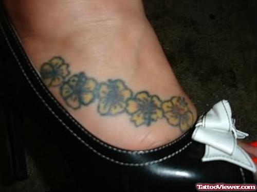 Bubbly Hibiscus Tattoo On Foot
