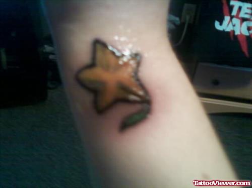 Star Flower Tattoo On Wrist