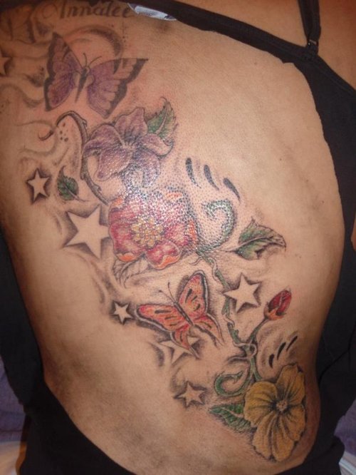 Colored Flowers and Flower Tattoos On Back