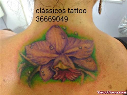 purple flower with dew drops tattoo