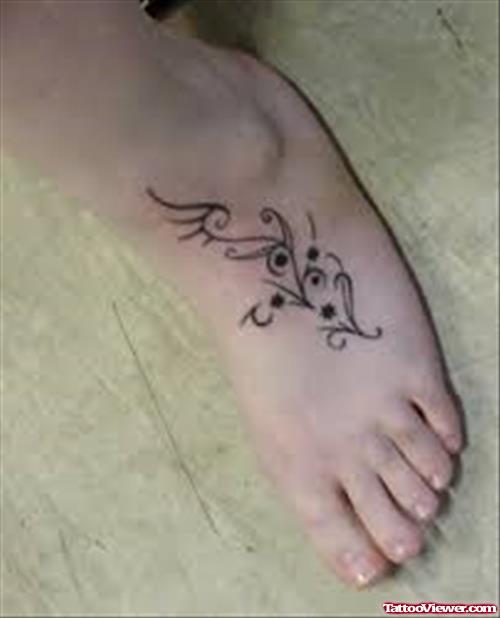 Swirl Foot Tattoo