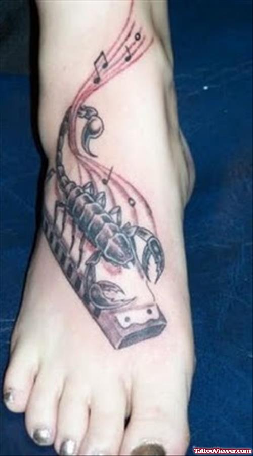 Grey Ink Scorpio And Music Notes Tattoo On Right Foot