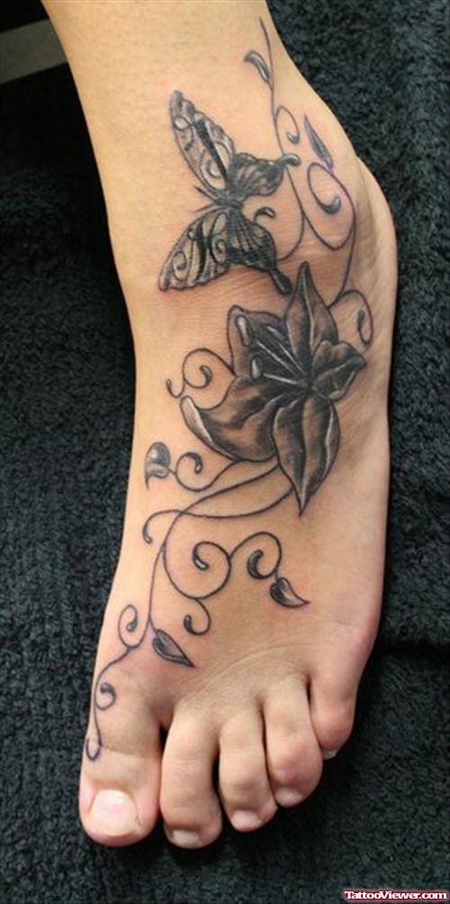 Grey Flower And Butterfly Foot Tattoo