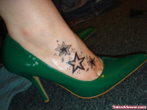 Black Ink Stars Foot Tattoo For Girls