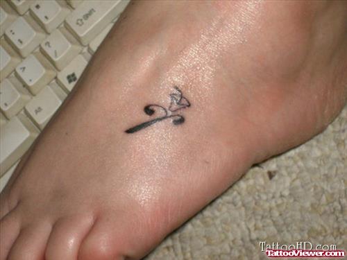 Beautiful Black Ink Foot Tattoo