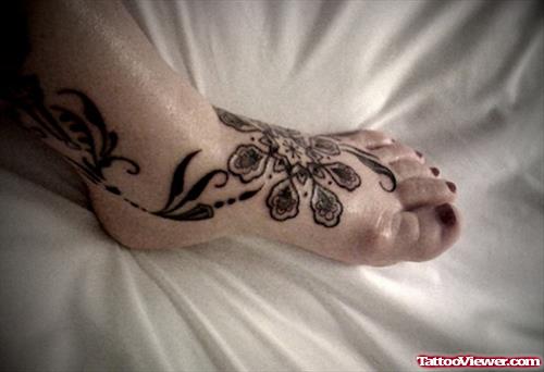 Black Ink Flower Foot Tattoo