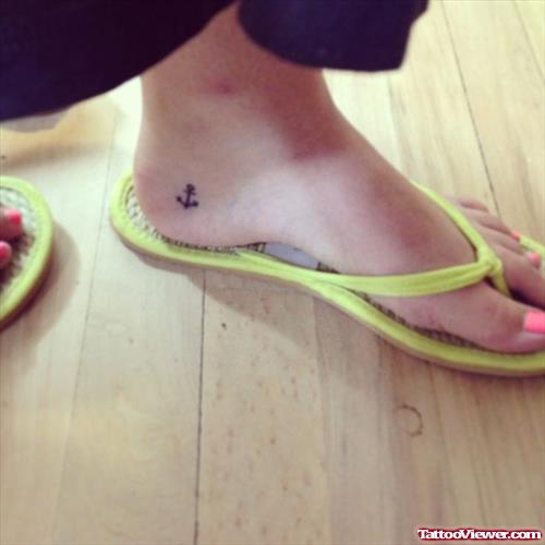 Tiny Anchor Foot Tattoo