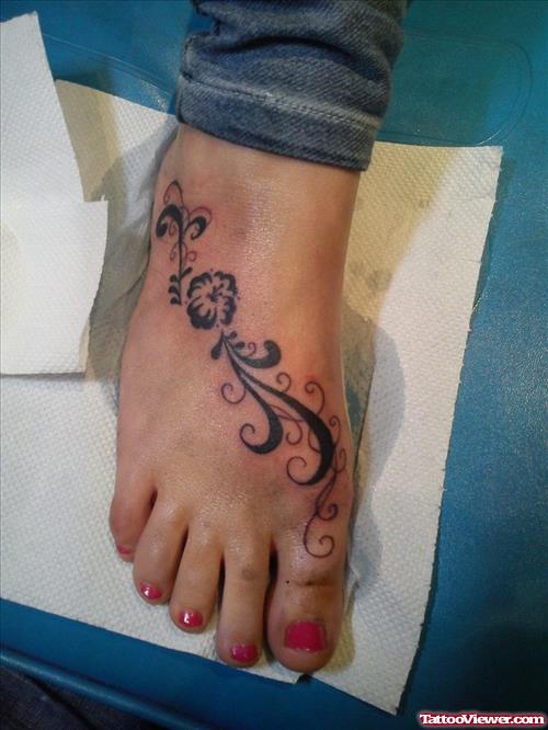 Girl With Swirls Foot Tattoo