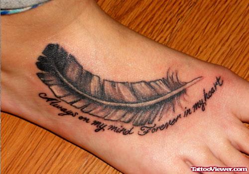 Feather And Lettering Foot Tattoo