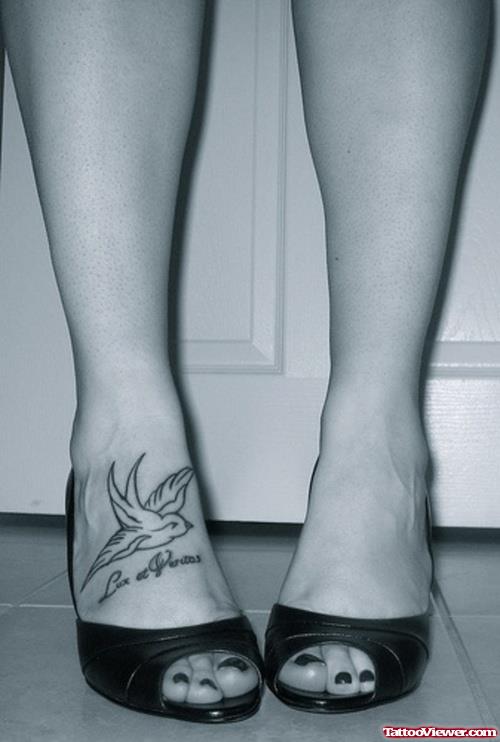 Lettering And Bird Foot Tattoo