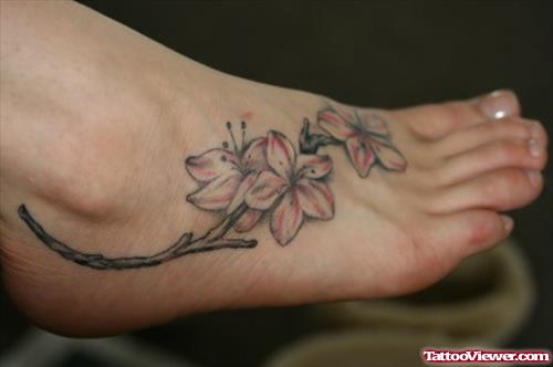 Grey Ink Flower Foot Tattoo For Girls