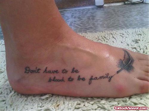 Feather And Quote Tattoos On Foot