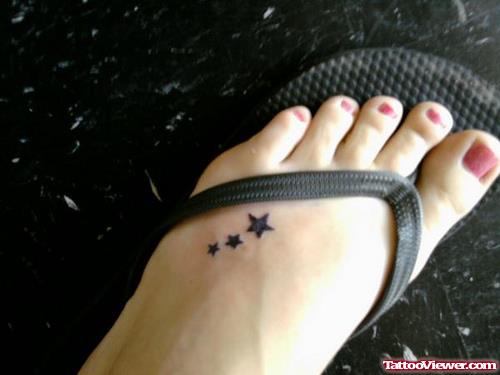Awesome Black Stars Foot Tattoo