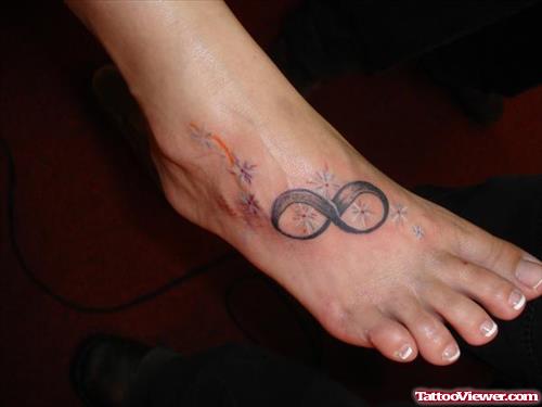 Shooting Stars And Infinity Foot Tattoo