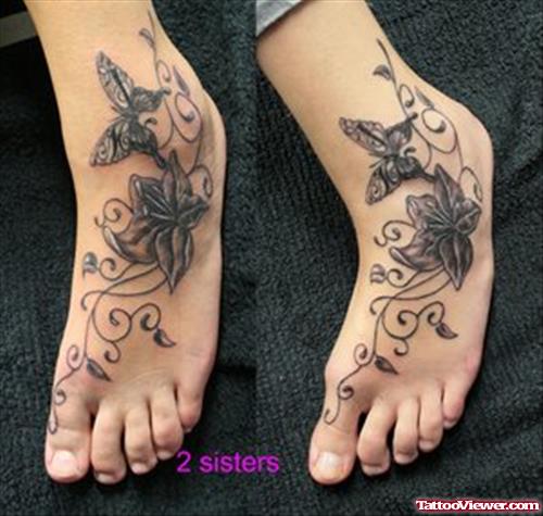 Grey Ink Hibiscus Flower And Butterfly Foot Tattoo