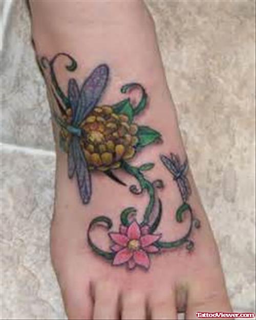 Flowers And Dragonfly Foot Tattoo