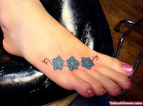 Blue Flowers Tattoos On Girl Right Foot