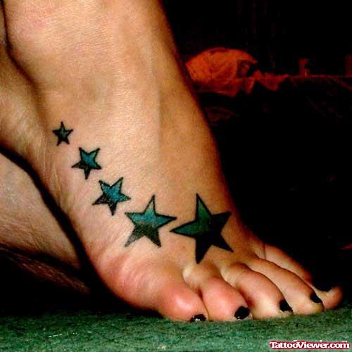 Attractive Colored Stars Foot Tattoo
