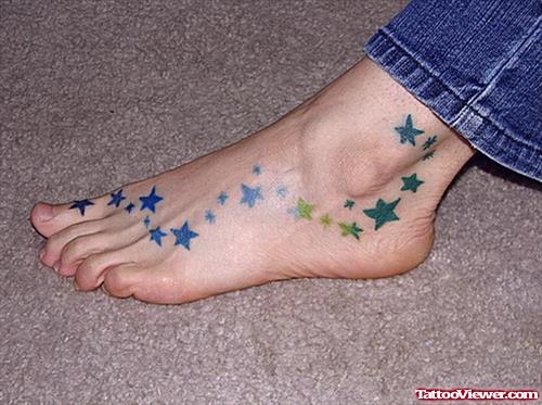 Colored Stars Tattoos On Left Foot