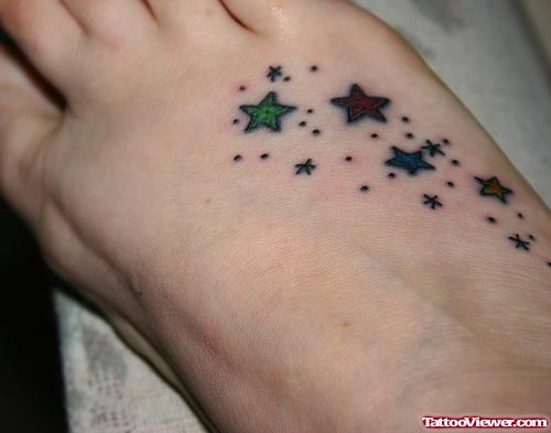 Beautiful Colored Stars Foot Tattoo