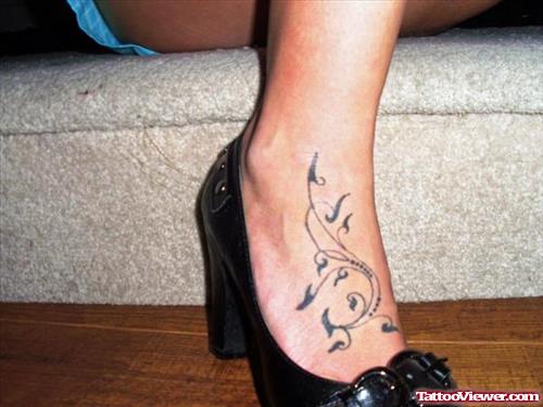 Attractive Girl With Foot Tattoo